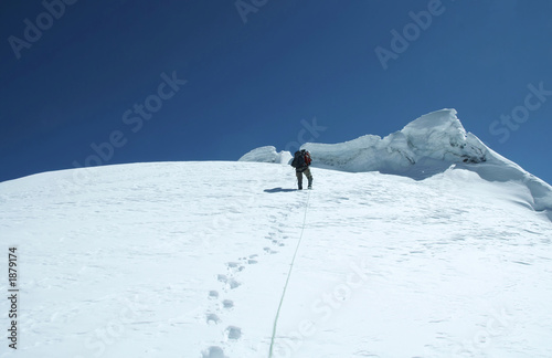 climber on the peak photo