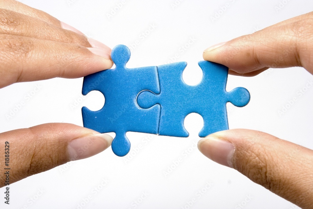 holding jigsaw puzzle holding jigsaw puzzle