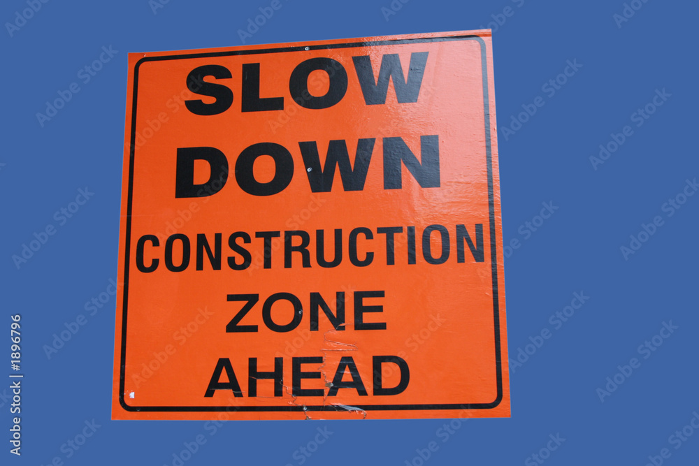 slow down construction zone ahead