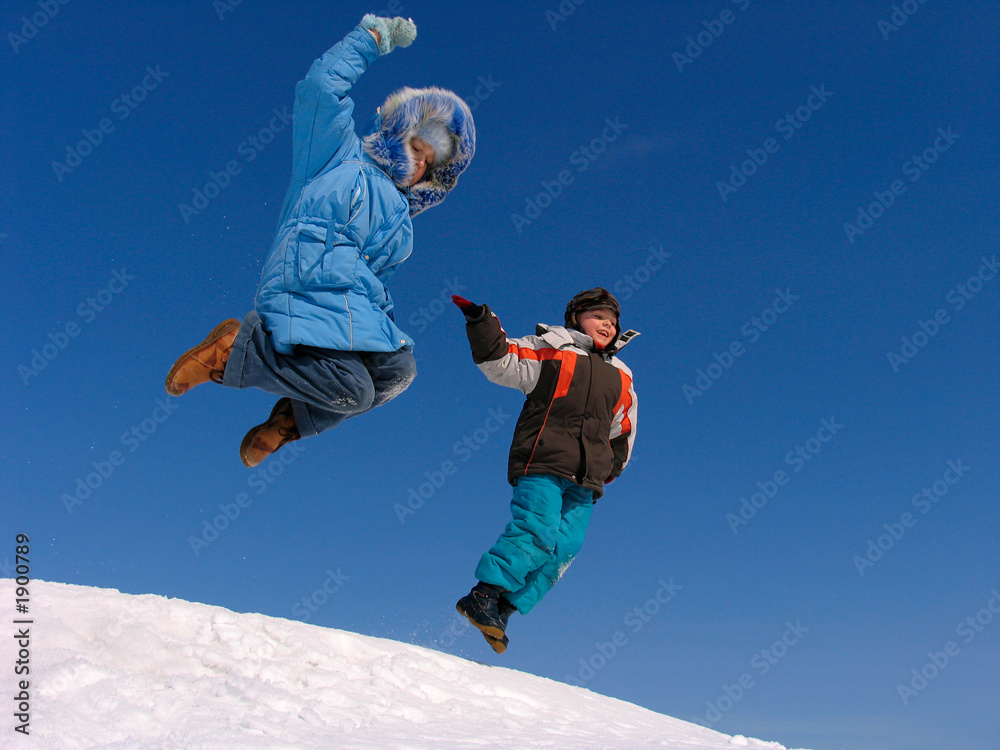 jumping boy and girl