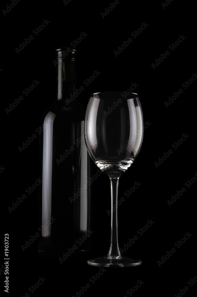 bottle of wine and empty glass