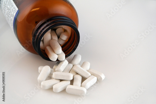 white calcium pills