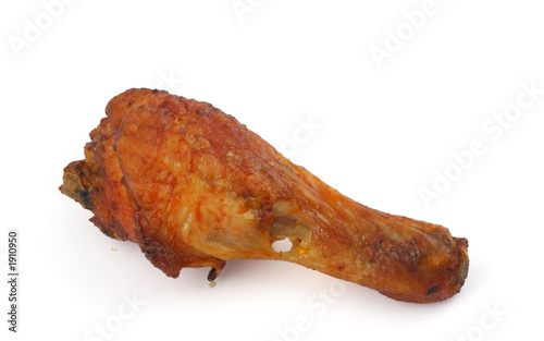 fried chicken leg on white background photo