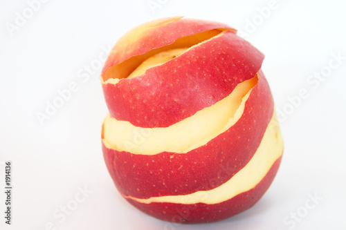 half peeled red apple photo