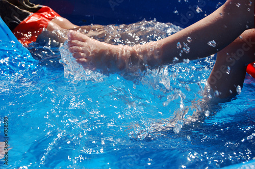 kicking in kiddie pool