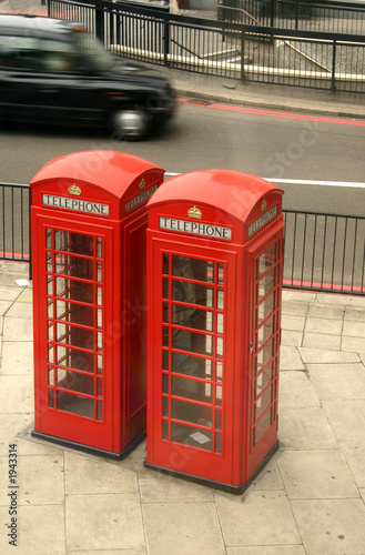 red telephone boxes and black taxi