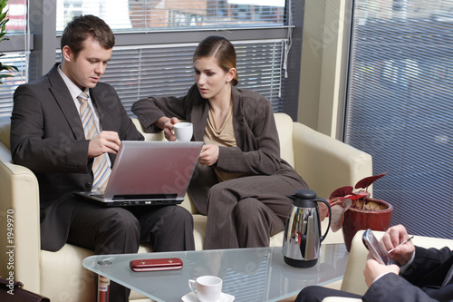 business people sitting in the office and talking