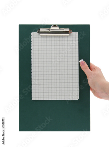 female hand holding a clipboard with squared paper photo