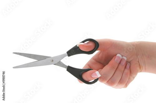 female hand holding scissors