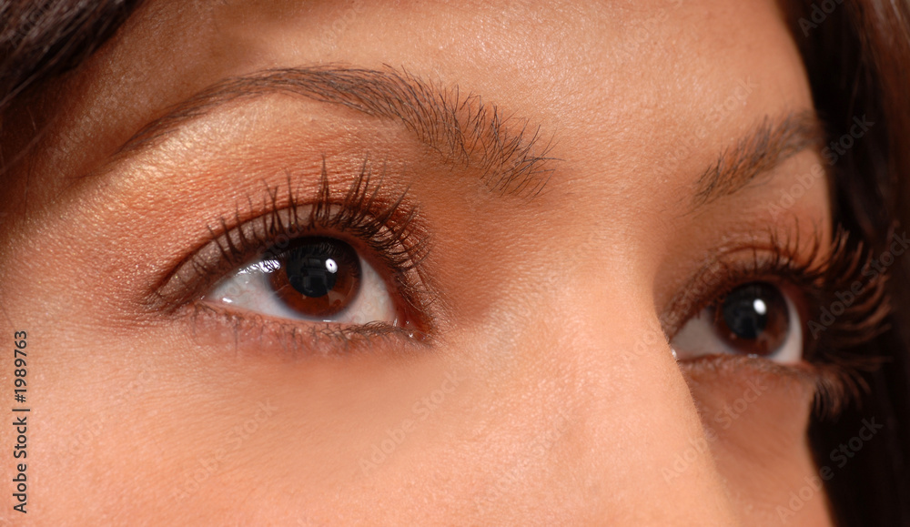 Fototapeta premium closeup of attractive woman's brown eyes