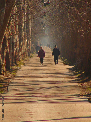 couple walking in long alley