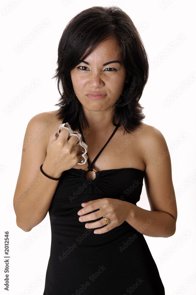 Foto de sexy asian girl with brass knuckles do Stock