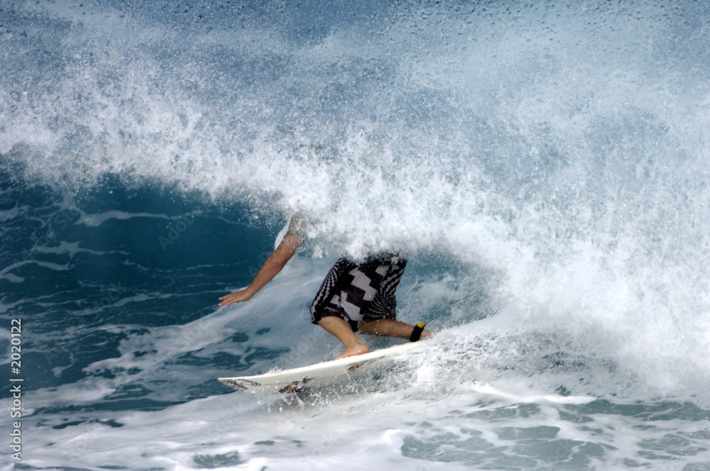 surfer inside the tube