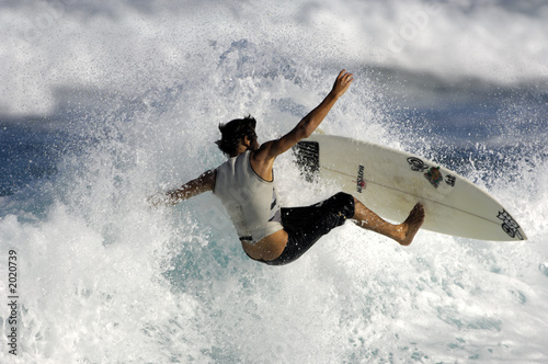 surfer snaping the whitewash photo