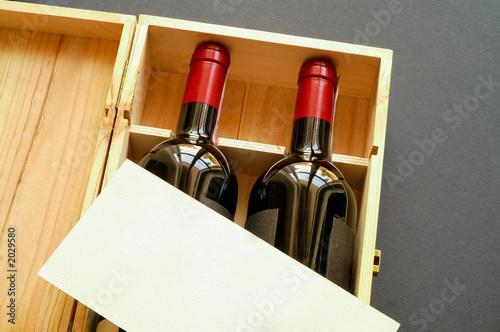 wood gift box with two wine bottles and blank card