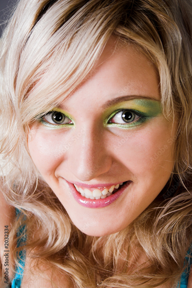 beautiful young woman with green eyes smiling beautiful young woman with green eyes smiling