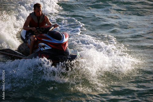 jetski rider at sunset