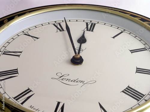 wall clock nearing midnight