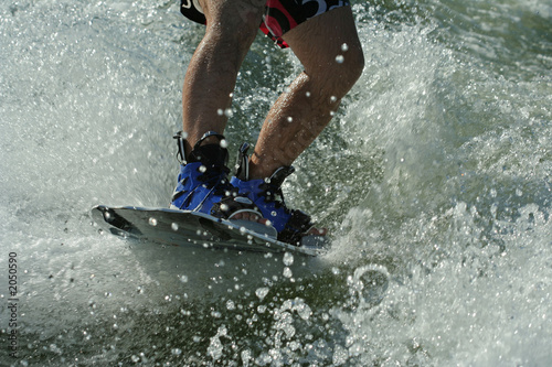 young man wakeboarding