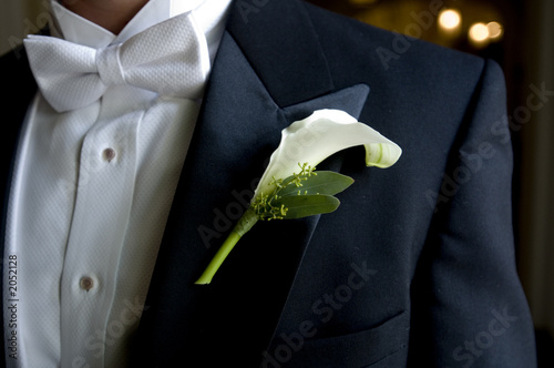 close up of groom's boutonniere