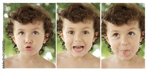 фотографія adorable happy boy making trivialities