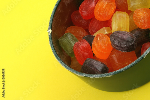 colorful fruit drops on yellow