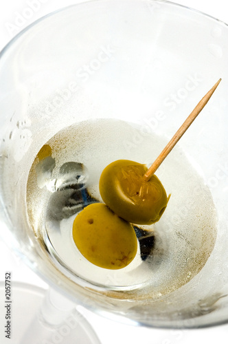glass with martini and olives