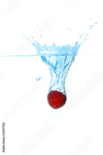 strawberry drop into water