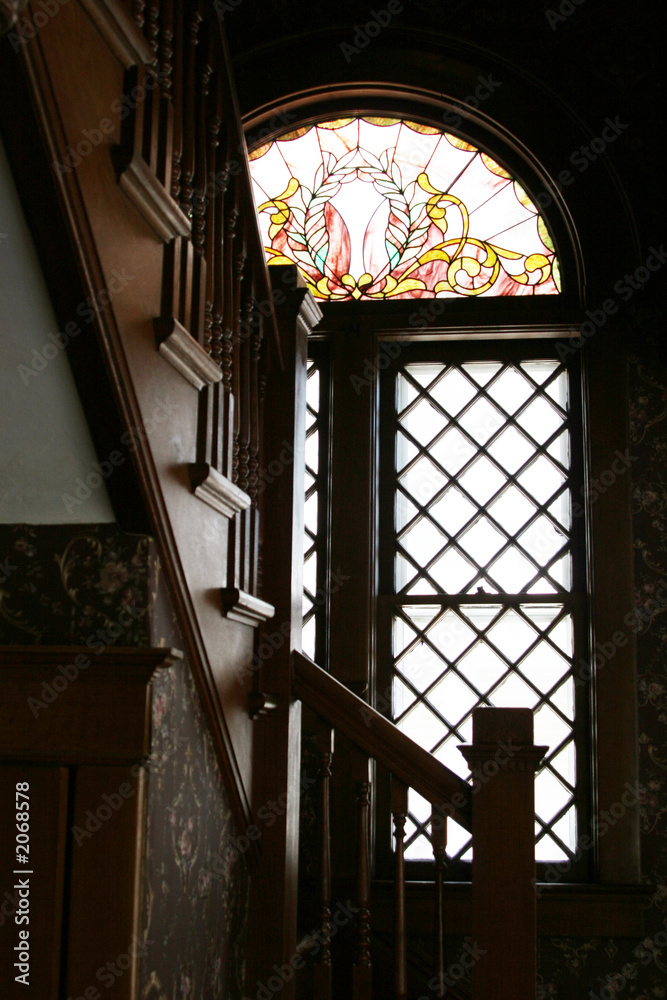 stained glass window by the stair case