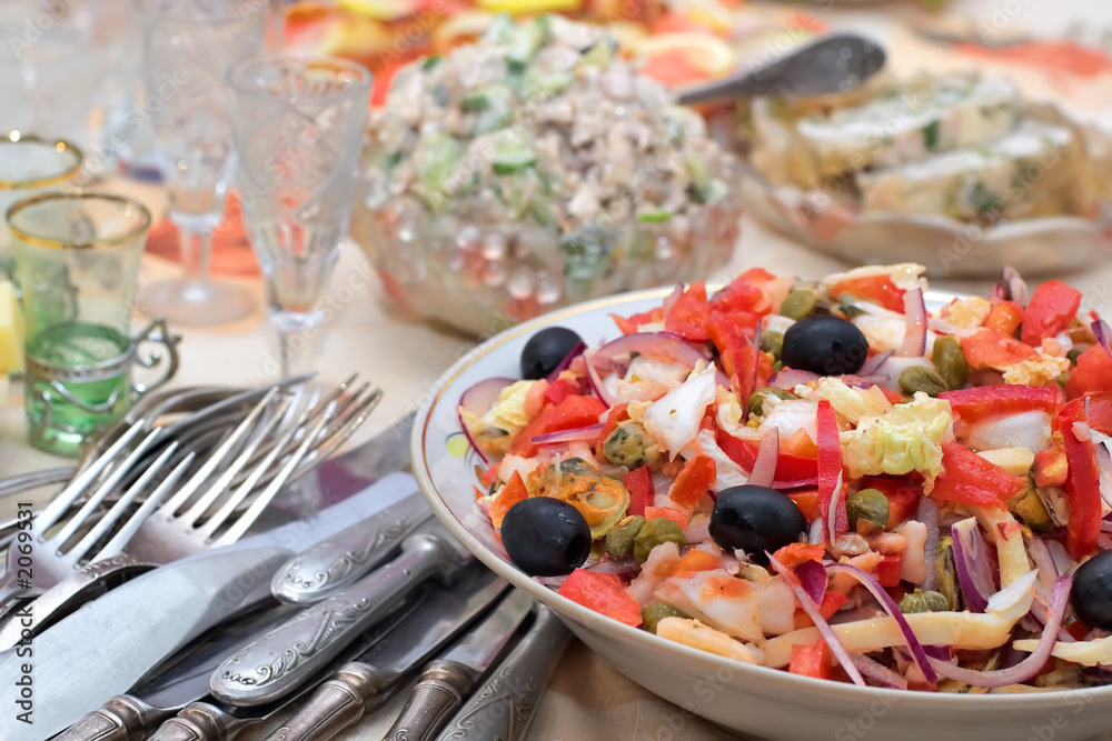 salad from seafoods with olives and vegetables salad from seafoods with olives and vegetables
