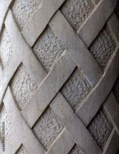  detail of old carved cement column photo