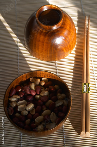 Canvas Print bamboo pannikin with peanuts