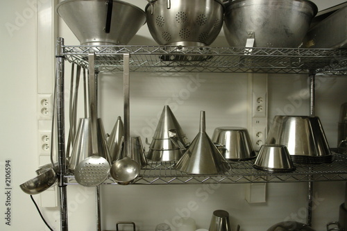 rack with professional cooking materials