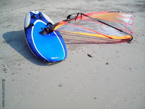 wind surf board lying on the beach at bintan, indo