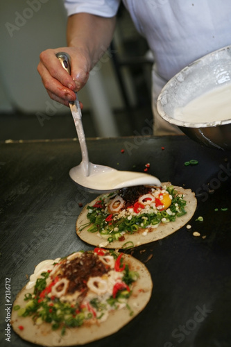 preparing okonomiyaki