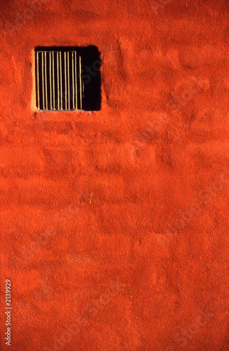 vent in red wall