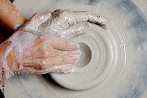 potter working clay
