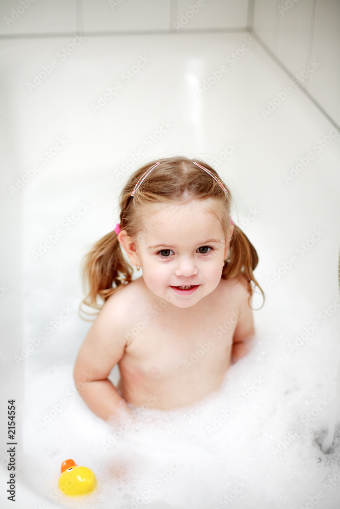 small girl in bath