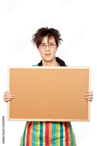 housewife holding the empty corkboard