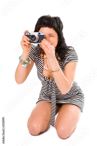 beauty girl photographer in sailor's vest with photo camera photo