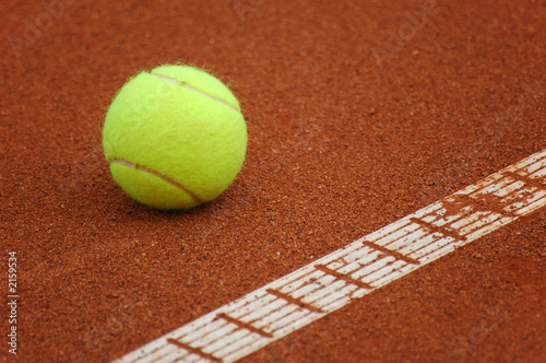 tennis ball and court line. © Blaz Kure