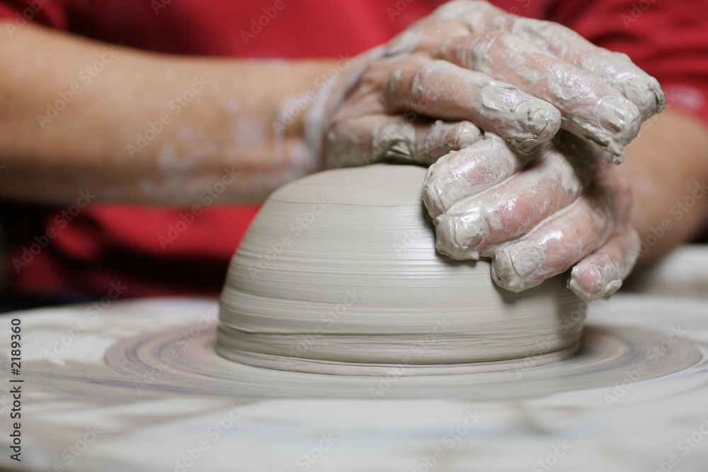 potter working clay