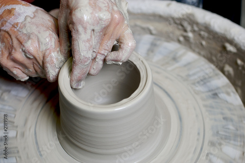 potter working clay