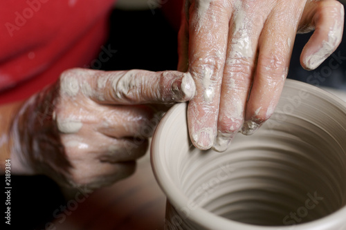 potter working clay