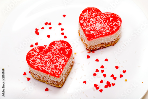 two heart-shaped cakes on the plate