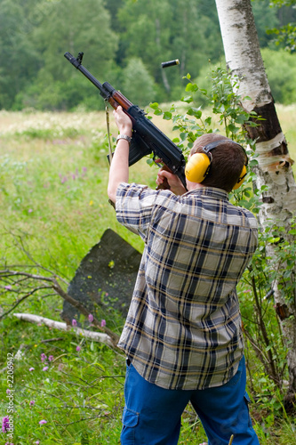 man shooting a bird