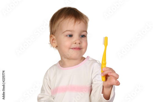 baby with tooth brush