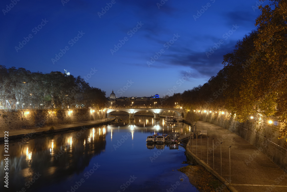 the tiber river just before sunrise, rome, italy