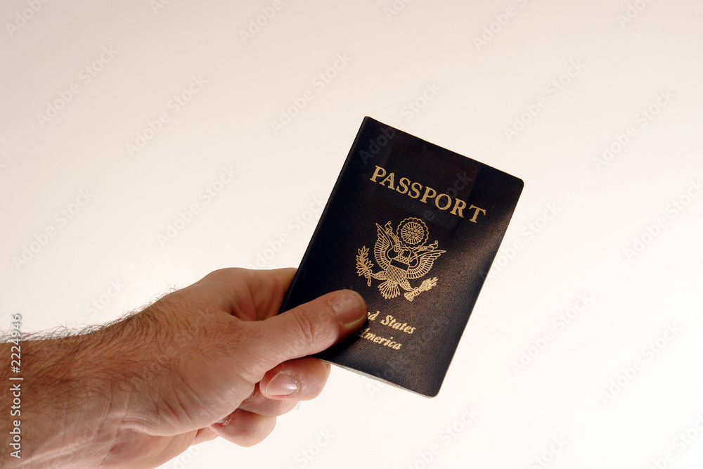 hand and passport hand and passport