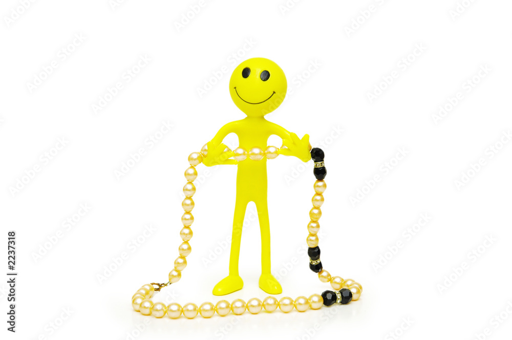 smilies and pearl necklace isolated on white smilies and pearl necklace isolated on white